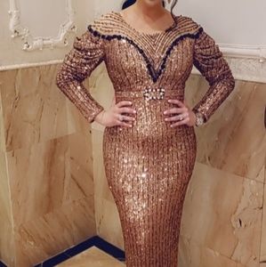 Fully beaded long sleeve gown